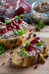 chicken liver or goose pate on wholegrain bread and cranberry