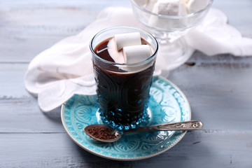 Hot chocolate with marshmallows in glass,