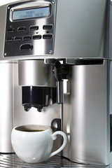coffee maker and cup