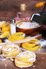 Still life of preparing pasta on rustic wooden background