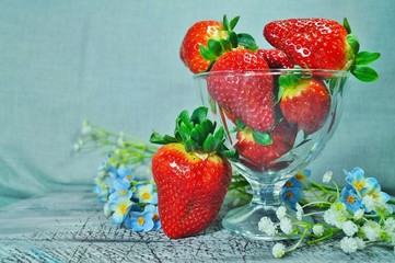 fresh strawberries in a glass dish