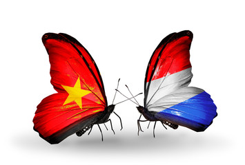 Two butterflies with flags Vietnam and Luxembourg