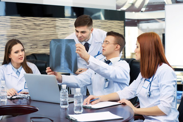 Fototapeta premium Medical workers working in conference room
