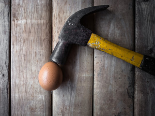 Old steel hammer and egg