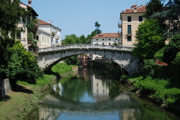 Fototapeta na wymiar San Michele bridge on Retrone river in Vicenza, Italy