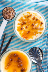 serving homemade creme brulee overhead
