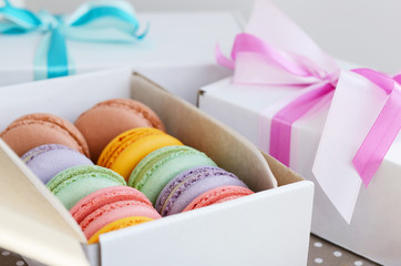 Set of colorful macaroon and gift boxes with ribbon and bow - 79527243