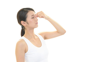 頭痛を訴える女性