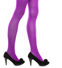 Woman long legs and violet stockings isolated