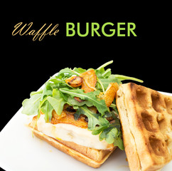 Homemade waffle burger on a white ceramic plate
