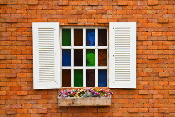 Window with flower pots.