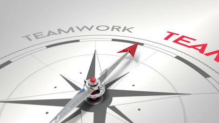 Compass pointing to teamwork - Powered by Adobe