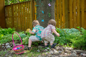 Two Boys Find Easter Eggs - 79531640