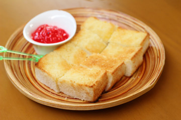 Bread, butter and strawberry jam