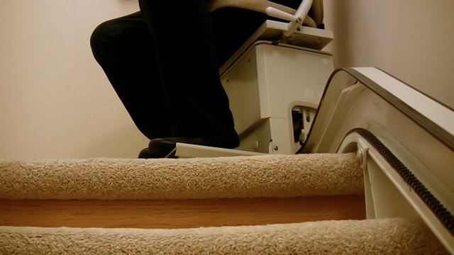 Woman on Stair Lift Chair