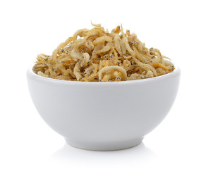 small fried fish in the bowl on white background