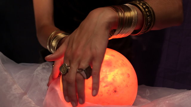 Fortune teller using crystal ball