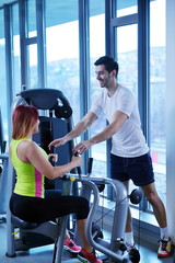Fototapeta premium woman exercising with her personal trainer