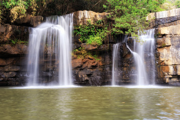 Fototapeta na wymiar White stream waterfall in Thailand