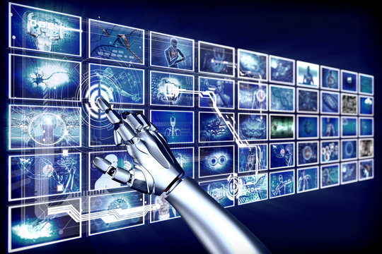 Robot arm pointing at hi-tech screens