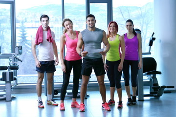 Group of people exercising at the gym