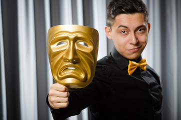 Funny concept with theatrical mask
