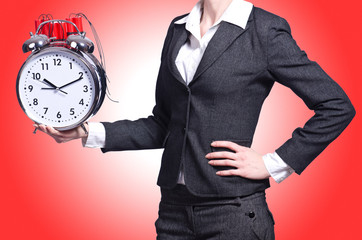 Woman with dynamite and clock on white