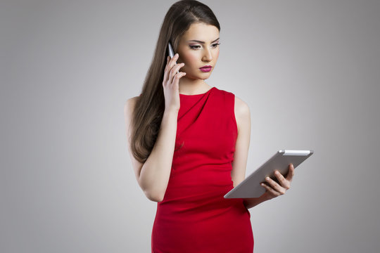 Sexy secretary talking on the phone