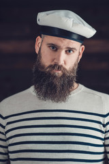 Man with Goatee in Stripe Shirt and Sailor Hat