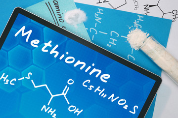 Tablet with the chemical formula of  Methionine. Amino acids.