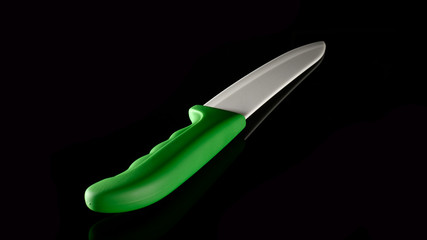 Ceramic knife isolated on black background