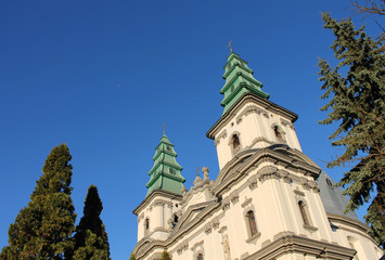 Fototapeta na wymiar Traditional Catholic Church against the sky