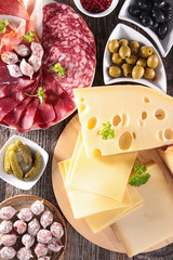 assortment of cheese, meat