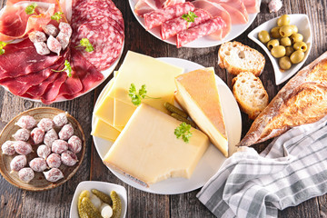 assortment of cheese, meat