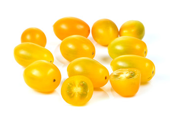Yellow tomatoes on white background