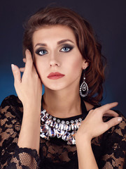 Beautiful young woman in jewelery