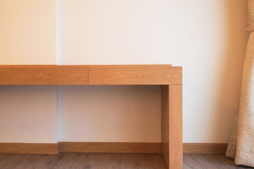 Closed up wood table in hotel room