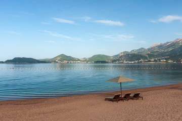 Beautiful beach with sunshades in Montenegro, Balkans