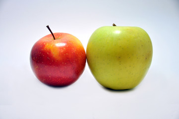 Green and red apple on white background