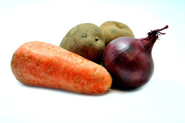 Potato, Carrot, and Beet close up on white background