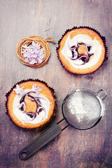 Fototapeta na wymiar Cakes with berries and cream