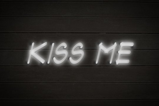 Composite image of kiss me sign