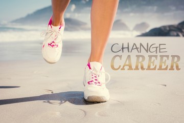 Composite image of fit woman walking on the beach