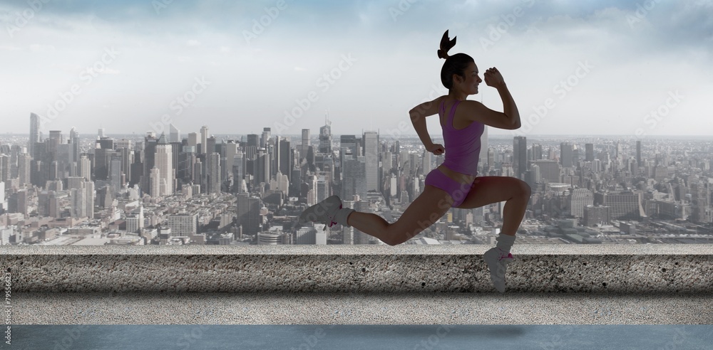 Poster Composite image of fit brunette running and jumping