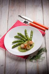 scallop over asparagus cream and boiled asparagus salad