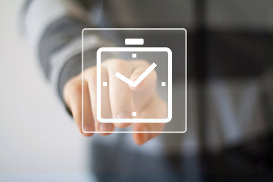 Businessman hand press web clock button time
