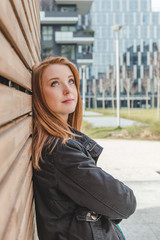 Beautiful girl posing in the city streets