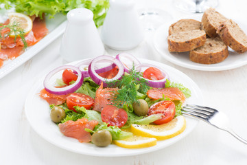 salad with salted salmon on a plate