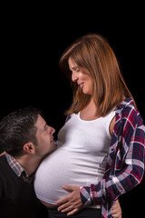 Close view of a expecting pregnant couple