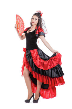 Traditional Spanish Flamenco woman dancer in a red dress with